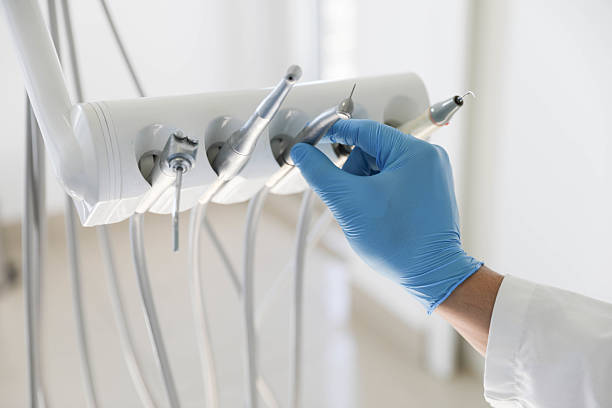 Professional Tooth Extraction technician working in New Canaan, CT